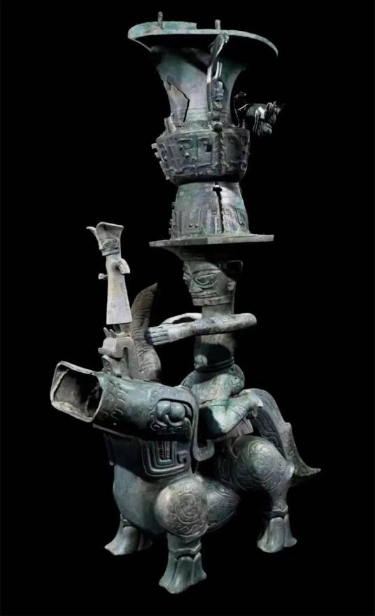 铜顶尊跪坐人像