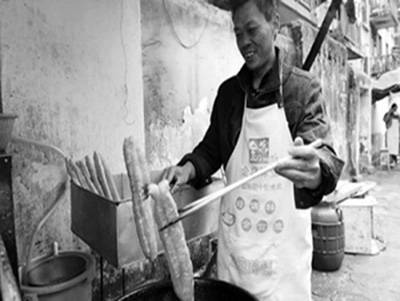 油条哥（四川“低铝含量”油条研制者）